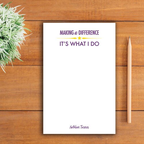 making a difference large notepad sitting on a table