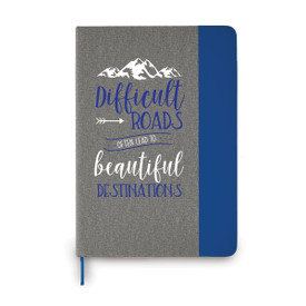 This Heather Gray Hardbound Journal With A Blue Accents Features The Inspirational Message “Difficult Roads Often Lead To Beautiful Destinations”