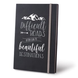 This Matte Black Hardbound Journal With A Colorful Elastic Band Features The Message “Difficult Roads Often Lead To Beautiful Destinations”