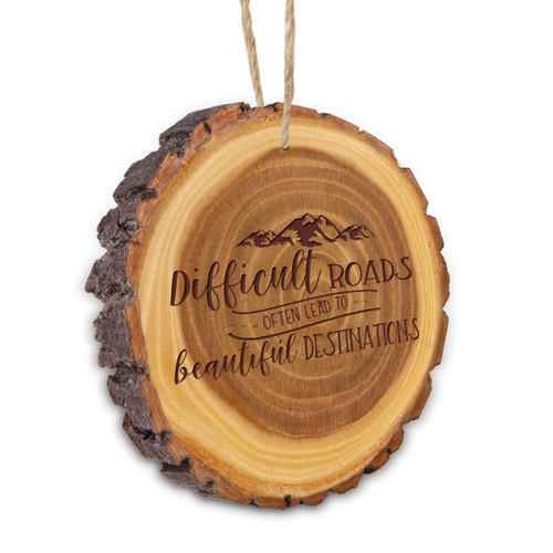 This Rustic Wood Slice Ornament Features The Inspirational Laser Engraved Message “Difficult Roads Often Lead To Beautiful Destinations”