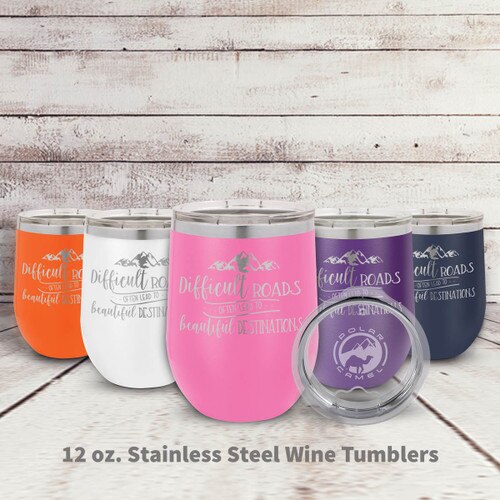 multiple colors of stainless steel stemless wine tumblers with Beautiful Destinations message