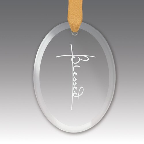 This Premium Crystal Oval Shaped Suncatcher Ornament Features The Inspirational Laser Engraved Message “Blessed”
