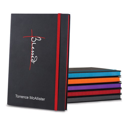 black matte journals in multiple accent colors with Blessed message and personalization