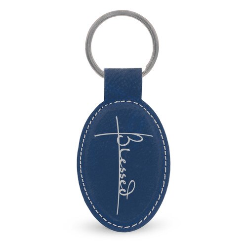 This Leather Oval Keychain With Metal Keyring Features The Inspirational Message “Blessed”
