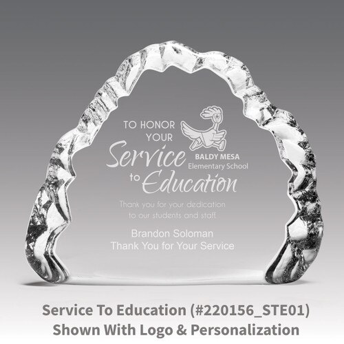 crystal clear iceberg with service to education message