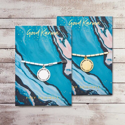 gold and silver bracelet with “Do More Of What Makes You Happy” message