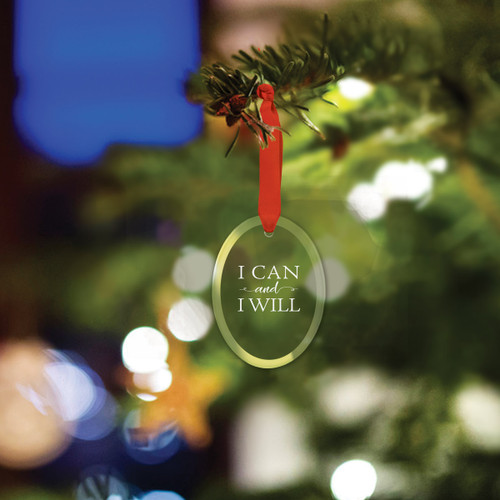 oval crystal ornament with i can and i will message and red ribbon