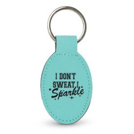 This Leather Oval Keychain With Metal Keyring Features The Inspirational Message “I Don’t Sweat I Sparkle”