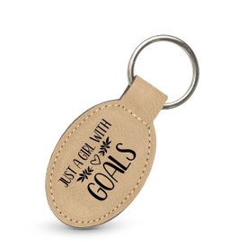 This Leather Oval Keychain With Metal Keyring Features The Inspirational Message “Just A Girl With Goals”