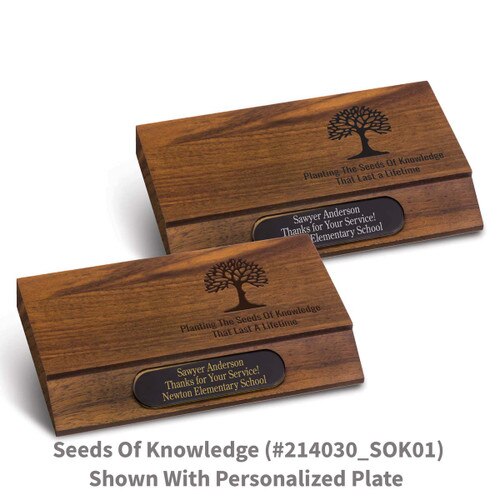 laser engraved walnut bases with seeds of knowledge message and personalized brass plate