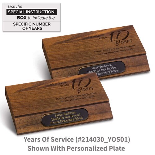 laser engraved walnut bases with 10 years of service message and personalized brass plate