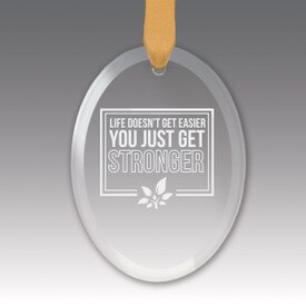 This Premium Crystal Oval Shaped Suncatcher Ornament Features The Inspirational Laser Engraved Message “Life Doesn’t Get Easier You Just Get Stronger”