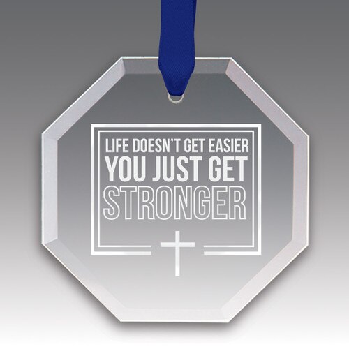 This Premium Crystal Octagon Shaped Suncatcher Ornament Features The Inspirational Laser Engraved Message “Life Doesn’t Get Easier You Just Get Stronger”