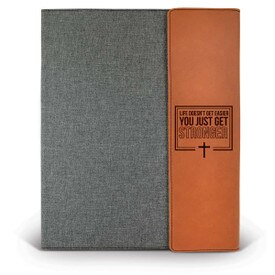This Large Canvas/Vegan Leather Padfolio With Notepad Features The Inspirational Message “Life Doesn’t Get Easier You Just Get Stronger”