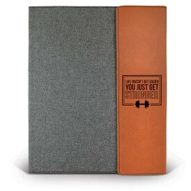 This Large Canvas/Vegan Leather Padfolio With Notepad Features The Inspirational Message “Life Doesn’t Get Easier You Just Get Stronger”