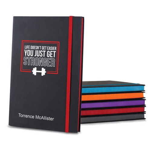 black matte journals in multiple accent colors with Life Doesn't Get Easier strength message and personalization