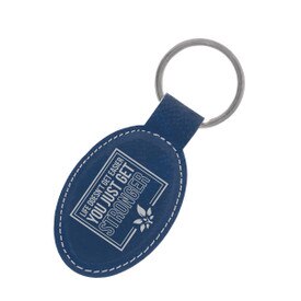 This Leather Oval Keychain With Metal Keyring Features The Inspirational Message “Life Doesn’t Get Easier You Just Get Stronger”