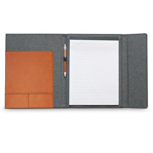 opened padfolio with lined notepad and rawhide pen