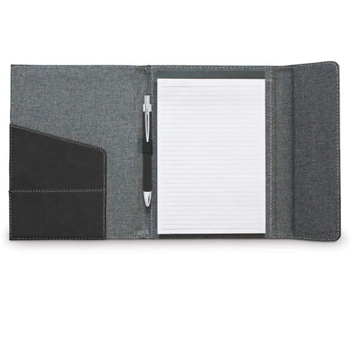 opened padfolio with lined notepad and black pen