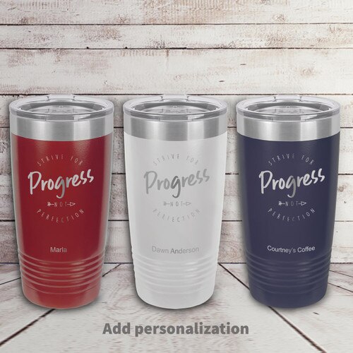 red, white, and navy blue stainless steel tumbler with Strive For Progress message and personalization