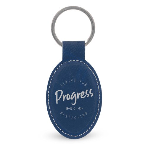 This Leather Oval Keychain With Metal Keyring Features The Inspirational Message “Strive For Progress Not Perfection”