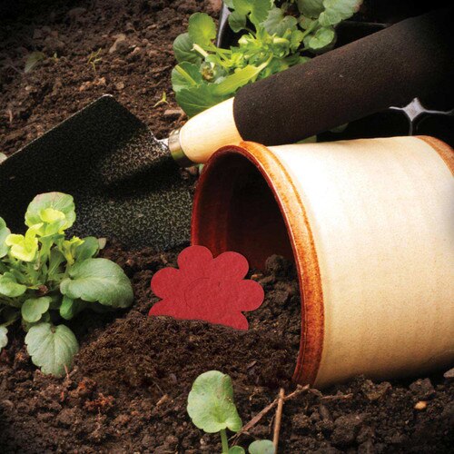 flower pot with dirt and shovel